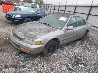 1996 Honda Accord LX with VIN 1HGCD563XTA289338, listed as a IAAI auction lot 41896052 with 221,401 mi miles and . Bid and sale history available at carsss.com. Image 2.