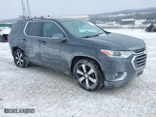 2021 Chevrolet Traverse LT Leather with VIN 1GNEVHKW8MJ140957, listed as a IAAI auction lot 41632635 with 57,848 mi miles. Bid and sale history available at carsss.com. Image 1.