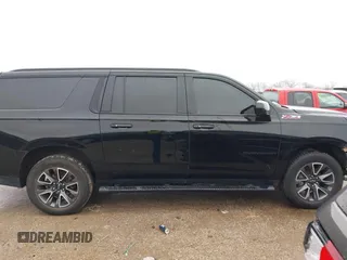 2022 Chevrolet Suburban Z71 with VIN 1GNSKDKD3NR251387, listed as a IAAI auction lot 41566234 with 154,014 mi miles. Bid and sale history available at carsss.com. Image 13.
