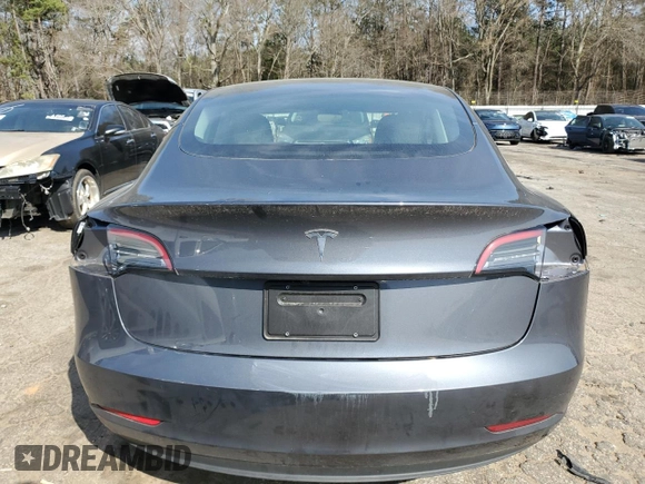 2023 Tesla Model 3 with VIN 5YJ3E1EA8PF699931, listed as a Copart auction lot 49293795 with 13,119 mi miles and Salvage Title. Bid and sale history available at DreamBid. Image 6.