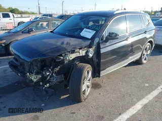 2018 Volkswagen Tiguan SEL Premium with VIN 3VV5B7AX1JM002585, listed as a IAAI auction lot 40495823 with 82,376 mi miles and . Bid and sale history available at DreamBid. Image 6.