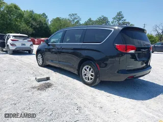 2023 Chrysler Voyager LX with VIN 2C4RC1CGXPR602904, listed as a IAAI auction lot 42059500 with 42,636 mi miles. Bid and sale history available at carsss.com. Image 3.