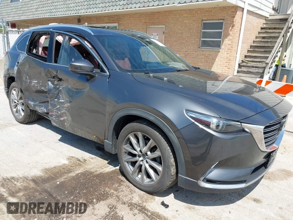 2016 Mazda CX-9 Signature with VIN JM3TCBEY2G0124433, listed as a IAAI auction lot 42194154 with 108,945 mi miles and . Bid and sale history available at DreamBid. Image 1.