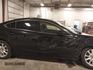 2016 Mazda 6 i Sport with VIN JM1GJ1U57G1433732, listed as a IAAI auction lot 41879844 with 107,269 mi miles and . Bid and sale history available at DreamBid. Image 13.