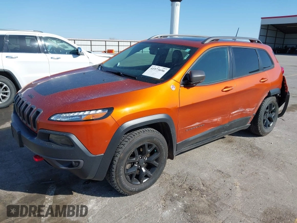 2016 Jeep Cherokee Trailhawk with VIN 1C4PJMBBXGW251682, listed as a IAAI auction lot 41973696 with 100,411 mi miles. Bid and sale history available at carsss.com. Image 18.