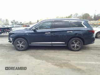2016 Infiniti QX60 with VIN 5N1AL0MM0GC506599, listed as a IAAI auction lot 41921886 with 113,821 mi miles. Bid and sale history available at carsss.com. Image 15.