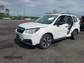2018 Subaru Forester z VIN JF2SJABC5JH444739, wystawiony jako IAAI lot #42123918 z przebiegiem 124 520 mil mil oraz . Historia ofert i sprzedaży dostępna na DreamBid. Obrazek 2.