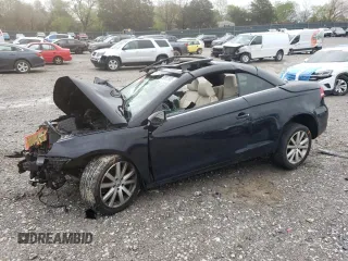 2013 Volkswagen Eos Komfort with VIN WVWBW8AH1DV006523, listed as a Copart auction lot 52037965 with 77,746 mi miles and Salvage Title. Bid and sale history available at DreamBid. Image 1.