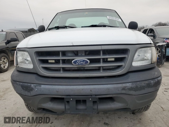 2003 Ford F-150 XL with VIN 1FTRF18W03NA77544, listed as a Copart auction lot 84805894 with Not provided miles and Salvage title. Bid and sale history available at DreamBid. Image 5.