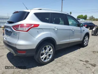 2015 Ford Escape Titanium with VIN 1FMCU0JX3FUB81735, listed as a Copart auction lot 61622995 with 154,932 mi miles and Clean title. Bid and sale history available at DreamBid. Image 3.