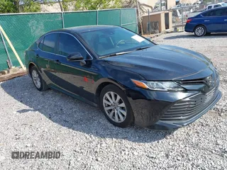 2019 Toyota Camry LE with VIN 4T1B11HK1KU718374, listed as a IAAI auction lot 42071905 with 86,460 mi miles and . Bid and sale history available at DreamBid. Image 1.