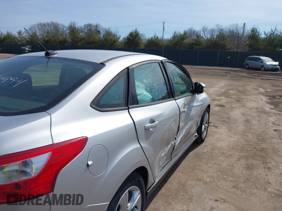 2014 Ford Focus SE with VIN 1FADP3F20EL427620, listed as a IAAI auction lot 41774994 with 60,080 mi miles and . Bid and sale history available at DreamBid. Image 6.