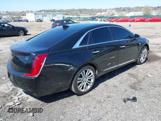 2018 Cadillac XTS Luxury with VIN 2G61M5S39J9161938, listed as a IAAI auction lot 42005882 with 102,335 mi miles. Bid and sale history available at carsss.com. Image 4.