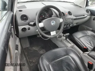 2004 Volkswagen Beetle z VIN 3VWCD31CX4M405570, wystawiony jako Copart lot #61769685 z przebiegiem 47 926 mil mil oraz Szkoda całkowita • Salvage title. Historia ofert i sprzedaży dostępna na DreamBid. Obrazek 8.