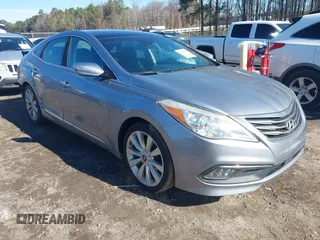 2016 Hyundai Azera Limited z VIN KMHFH4JGXGA568911, wystawiony jako IAAI lot #41428434 z przebiegiem 158 202 mil mil oraz . Historia ofert i sprzedaży dostępna na DreamBid. Obrazek 1.