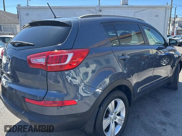 2011 Kia Sportage LX with VIN KNDPB3A28B7156209, listed as a Copart auction lot 52733855 with 204,767 mi miles and Clean Title. Bid and sale history available at carsss.com. Image 4.