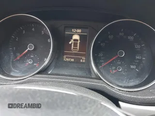 2016 Volkswagen Passat S z VIN 1VWAS7A31GC052520, wystawiony jako IAAI lot #41547408 z przebiegiem 129 730 mil mil oraz . Historia ofert i sprzedaży dostępna na DreamBid. Obrazek 7.