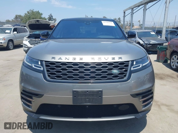 2019 Land Rover Range Rover Velar R-Dynamic SE z VIN SALYL2EX8KA784025, wystawiony jako IAAI lot #42786648 z przebiegiem 75 780 mil mil oraz . Historia ofert i sprzedaży dostępna na DreamBid. Obrazek 12.