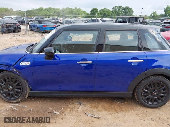 2021 MINI Hardtop 4 Door Cooper S with VIN WMWXU9C00M2N60370, listed as a IAAI auction lot 42426257 with 11,288 mi miles and . Bid and sale history available at DreamBid. Image 14.