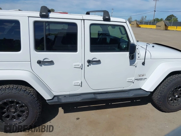 2017 Jeep Wrangler Unlimited Sahara with VIN 1C4BJWEG5HL588535, listed as a IAAI auction lot 42013571 with 70,012 mi miles. Bid and sale history available at carsss.com. Image 14.