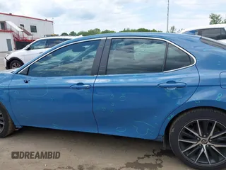 2023 Toyota Camry SE z VIN 4T1T11AK0PU115695, wystawiony jako IAAI lot #42221720 z przebiegiem 67 575 mil mil oraz . Historia ofert i sprzedaży dostępna na DreamBid. Obrazek 14.
