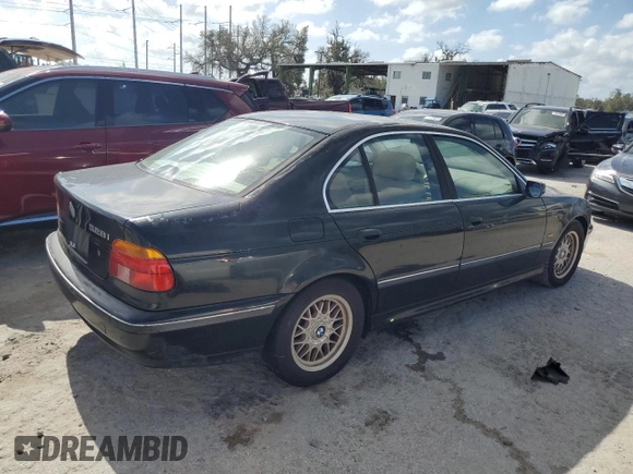 2000 BMW 5 Series 528iA with VIN WBADM6340YGU16735, listed as a Copart auction lot 77249644 with 0 mi miles and Salvage Title. Bid and sale history available at carsss.com. Image 3.