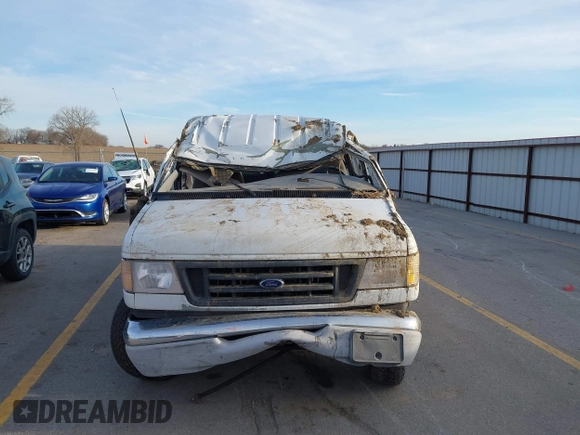 2000 Ford Econoline Passenger XL with VIN 1FBSS31L5YHB41693, listed as a IAAI auction lot 41850059 with 236,450 mi miles and . Bid and sale history available at DreamBid. Image 12.