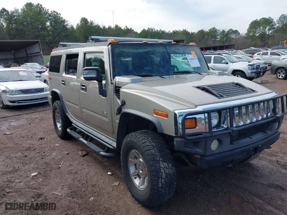 2005 Hummer H2 SUV with VIN 5GRGN23U65H101545, listed as a IAAI auction lot 41426274 with 293821 miles. Bid and sale history available at carsss.com. Image 1.
