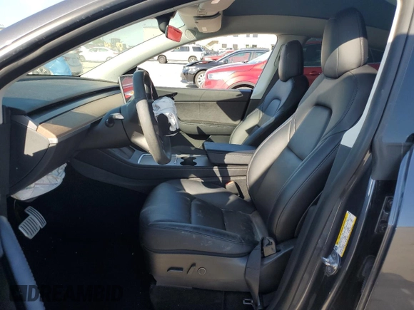2022 Tesla Model Y Performance with VIN 7SAYGDEF8NF384270, listed as a Copart auction lot 56718215 with Not provided miles and Salvage title. Bid and sale history available at DreamBid. Image 7.
