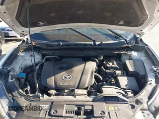 2014 Mazda CX-5 Sport with VIN JM3KE2BE8E0301175, listed as a IAAI auction lot 42051972 with 121,821 mi miles and . Bid and sale history available at carsss.com. Image 10.