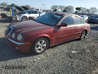 2000 Jaguar S-Type V6 z VIN SAJDA01C5YFL02627, wystawiony jako Copart lot #50090475 z przebiegiem 163 396 mil mil oraz Czysty tytuł • Clean title. Historia ofert i sprzedaży dostępna na DreamBid. Obrazek 1.