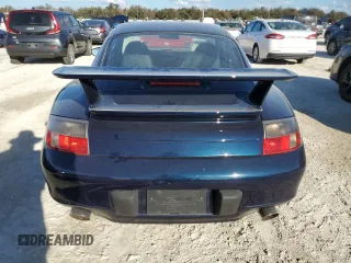 2000 Porsche 911 z VIN WP0AA2996YS621130, wystawiony jako Copart lot #77096434 z przebiegiem Nie podano mil oraz Szkoda całkowita • Salvage title. Historia ofert i sprzedaży dostępna na DreamBid. Obrazek 6.