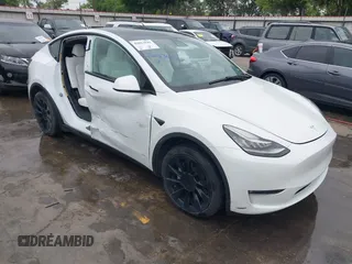 2022 Tesla Model Y Long Range z VIN 7SAYGDEE2NF420882, wystawiony jako IAAI lot #42023642 z przebiegiem 19 783 mil mil oraz . Historia ofert i sprzedaży dostępna na DreamBid. Obrazek 1.
