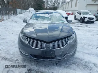 2015 Lincoln MKZ z VIN 3LN6L2J99FR606377, wystawiony jako IAAI lot #41597537 z przebiegiem 110 746 mil mil oraz . Historia ofert i sprzedaży dostępna na DreamBid. Obrazek 12.