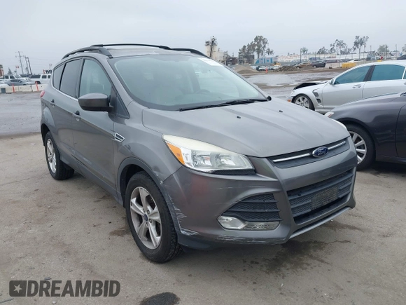 2014 Ford Escape SE with VIN 1FMCU9GX7EUC04296, listed as a IAAI auction lot 42159486 with 108,598 mi miles and . Bid and sale history available at DreamBid. Image 1.