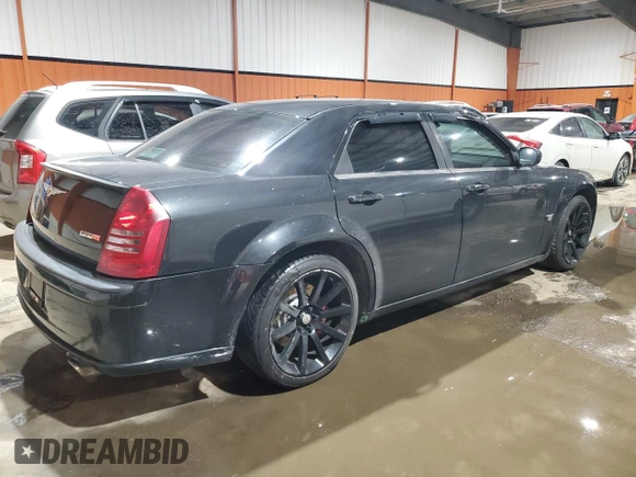 2006 Chrysler 300 C SRT8 with VIN 2C3LA73WX6H295488, listed as a Copart auction lot 83152984 with 209,544 mi miles and Clean Title. Bid and sale history available at carsss.com. Image 3.