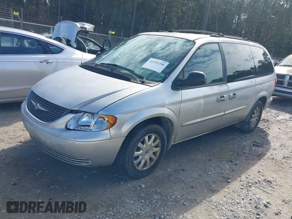 2003 Chrysler Town & Country LX with VIN 2C4GP44L03R203678, listed as a IAAI auction lot 41293296 with 210,827 mi miles and . Bid and sale history available at DreamBid. Image 2.