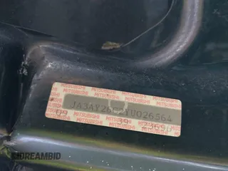 2000 Mitsubishi Mirage DE z VIN JA3AY26C2YU026564, wystawiony jako IAAI lot #42139336 z przebiegiem 53 947 mil mil oraz . Historia ofert i sprzedaży dostępna na DreamBid. Obrazek 13.