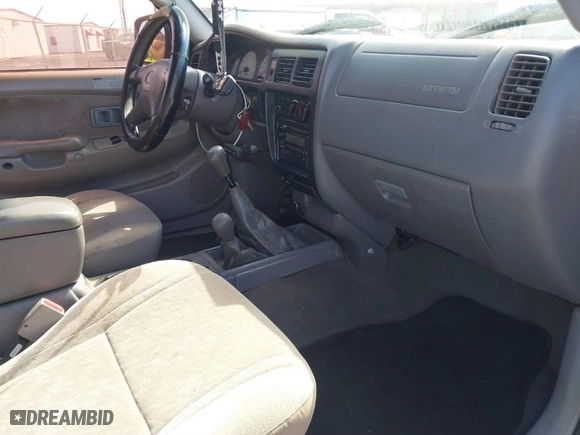 2004 Toyota Tacoma with VIN 5TEWN72NX4Z400831, listed as a IAAI auction lot 41639688 with 319,420 mi miles. Bid and sale history available at carsss.com. Image 5.