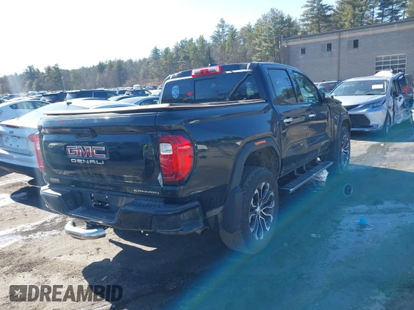 2023 GMC Canyon 4WD Denali with VIN 1GTP6FEK8P1263495, listed as a IAAI auction lot 41751989 with 55,501 mi miles and . Bid and sale history available at DreamBid. Image 4.