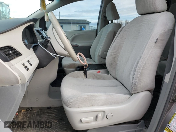 2014 Toyota Sienna LE with VIN 5TDJK3DC7ES073648, listed as a Copart auction lot 50554095 with 136,236 mi miles and Salvage Title. Bid and sale history available at DreamBid. Image 7.