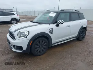 2018 MINI Countryman Cooper S z VIN WMZYT3C31J3D99568, wystawiony jako IAAI lot #42131017 z przebiegiem 54 992 mil mil oraz . Historia ofert i sprzedaży dostępna na DreamBid. Obrazek 17.