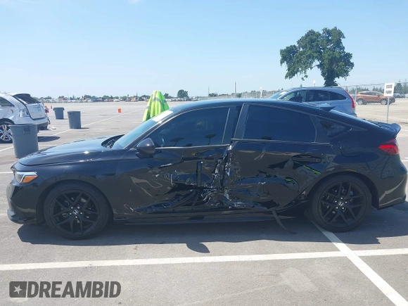 2023 Honda Civic Sport with VIN 19XFL2H84PE001354, listed as a IAAI auction lot 42053691 with 34,127 mi miles and . Bid and sale history available at DreamBid. Image 14.