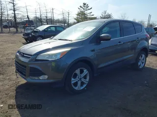 2013 Ford Escape SE with VIN 1FMCU9GX8DUD58286, listed as a IAAI auction lot 41797161 with 189,467 mi miles. Bid and sale history available at carsss.com. Image 2.