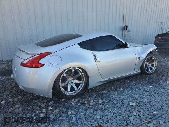 2010 Nissan 370Z with VIN JN1AZ4EH7AM500282, listed as a Copart auction lot 76578084 with 65,773 mi miles and Salvage Title. Bid and sale history available at DreamBid. Image 3.