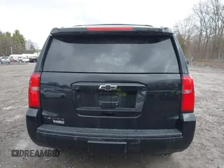 2018 Chevrolet Tahoe LT z VIN 1GNSKBKC7JR276427, wystawiony jako IAAI lot #41977418 z przebiegiem 152 007 mil mil oraz . Historia ofert i sprzedaży dostępna na DreamBid. Obrazek 16.