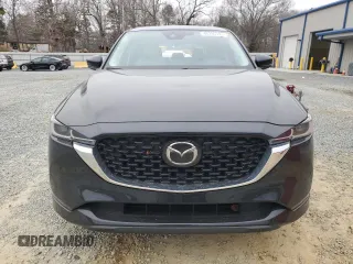 2024 Mazda CX-5 S Carbon Edition z VIN JM3KFBCLXR0496504, wystawiony jako Copart lot #48319375 z przebiegiem 19 041 mil mil oraz Szkody całkowita. Historia ofert i sprzedaży dostępna na DreamBid. Obrazek 5.