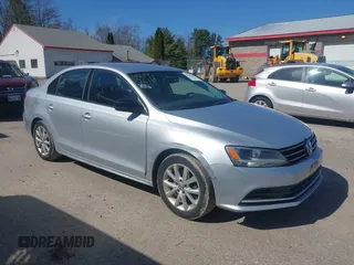 2015 Volkswagen Jetta Sedan 1.8T SE with VIN 3VWD17AJ0FM329783, listed as a IAAI auction lot 42142611 with 217,610 mi miles. Bid and sale history available at carsss.com. Image 14.