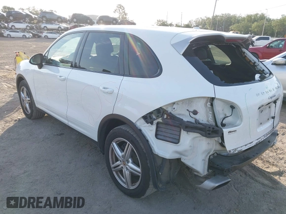 2014 Porsche Cayenne with VIN WP1AA2A23ELA97180, listed as a IAAI auction lot 42072423 with 143,374 mi miles and . Bid and sale history available at DreamBid. Image 3.