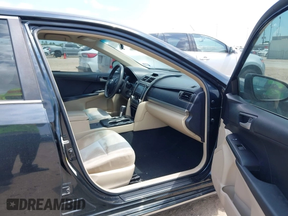 2012 Toyota Camry L with VIN 4T4BF1FK9CR170331, listed as a IAAI auction lot 42063148 with 198,477 mi miles. Bid and sale history available at carsss.com. Image 5.